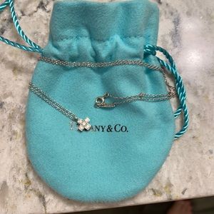Tiffanys platinum Diamond Cruciform cross pendant necklace.